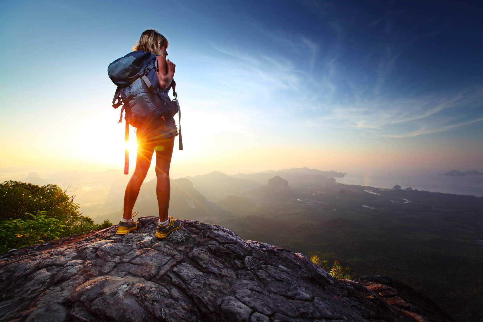 How to Choose Unique Travel Destinations Young lady hiker